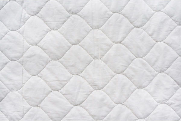 What Is a Mattress Pad and Which Type Do You Really Need