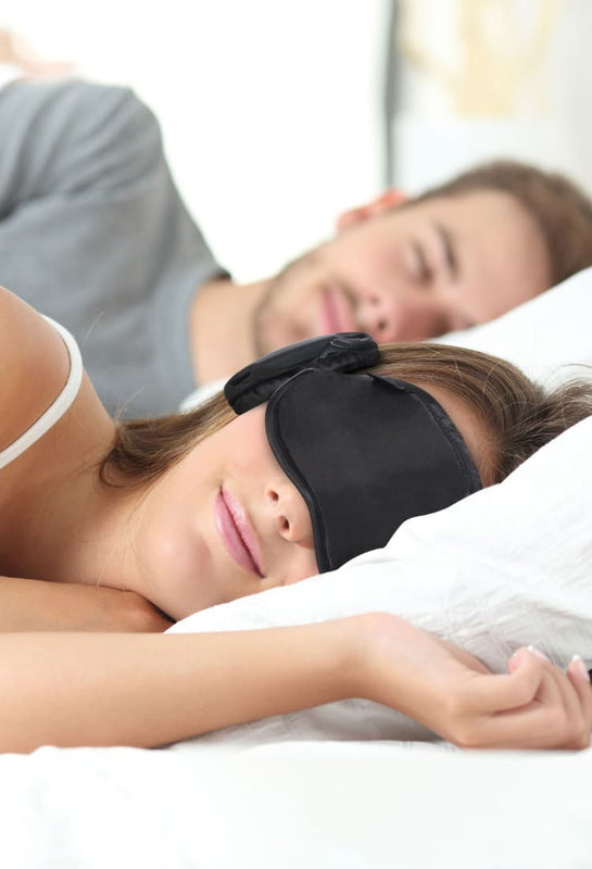 sleep mask - best sleep mask - sleep mask for night shift - shift workers sleep mask - travel sleep mask - sleep mask block snoring - sleep mask reduce noise - sleep mask block noise - couple sleeping woman wearing sleep mask mobile image